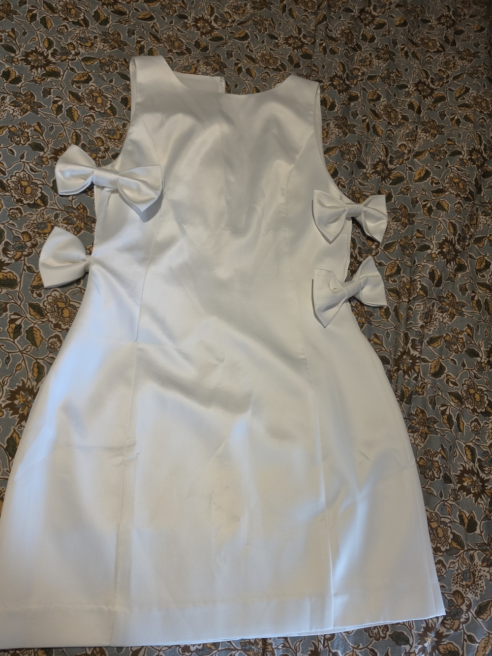 Vici White Sleeveless Mini Dress with Side Bow Accents